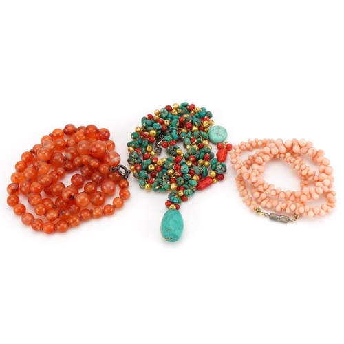 2357 - Three bead necklaces including a graduated coral example and one set with natural turquoise, total 1... 