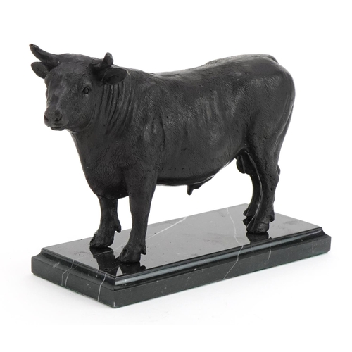 334 - Bronze study of a bull raised on a rectangular marble base, 25cm wide