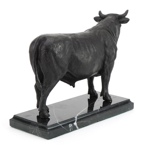 334 - Bronze study of a bull raised on a rectangular marble base, 25cm wide