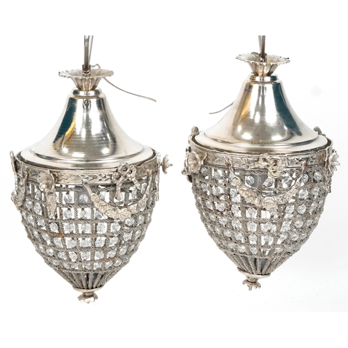 1062 - Pair of ornate silvered metal acorn chandeliers with swags and bows, 40cm high