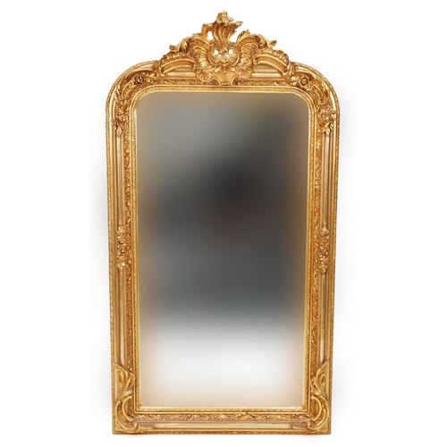 1018 - Large ornate gilt framed wall mirror with bevelled glass 158cm high x 84cm wide