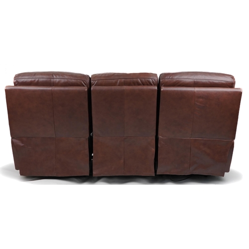 1066 - Contemporary brown leather three seater electric reclining sofa with USB charger ports, 205cm in len... 