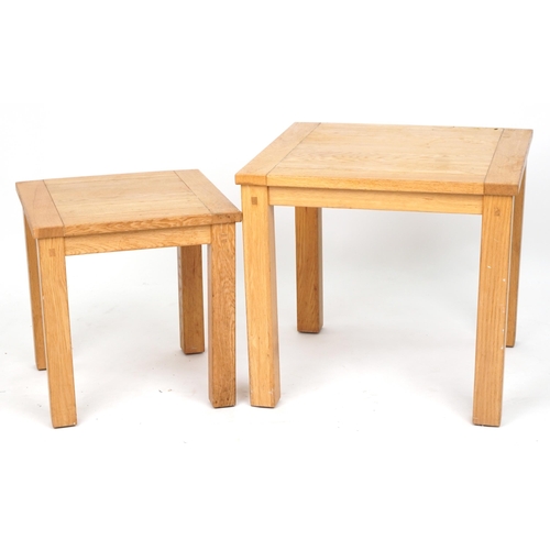 1093 - Two contemporary light oak occasional tables, the largest 55.5cm H x 60cm W x 60cm D