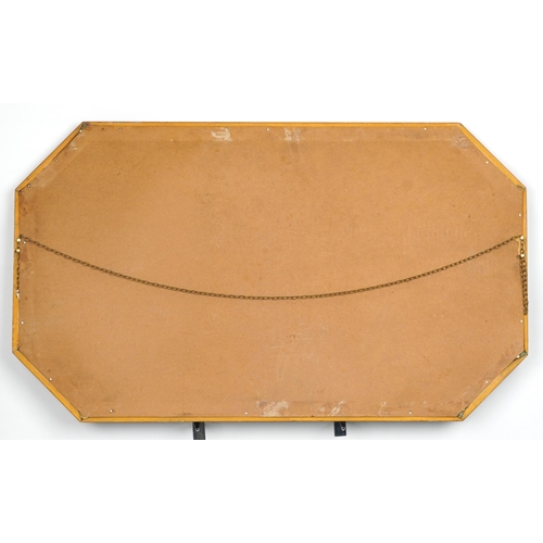 1090 - Large gilt framed octagonal wall hanging mirror with bevelled glass, 105cm x 61cm