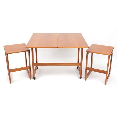 1080 - McIntosh, Mid century Scottish teak nest of three occasional tables with fold over top, 61cm H x 74c... 