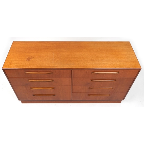 1057 - Mid century G Plan Fresco teak eight drawer chest, 76cm H x 142cm W x 44cm D