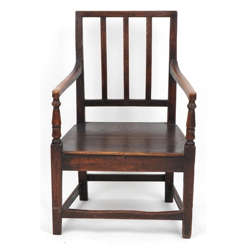 1055 - Antique oak open armchair, 90cm high