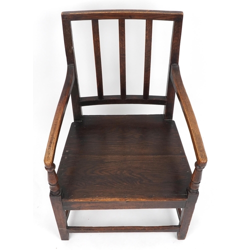 1055 - Antique oak open armchair, 90cm high