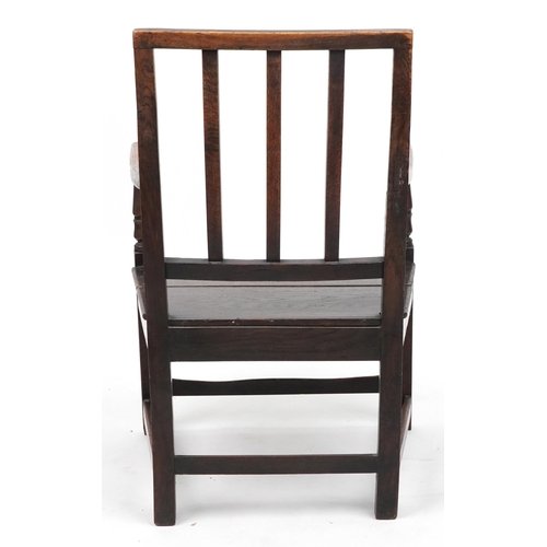 1055 - Antique oak open armchair, 90cm high