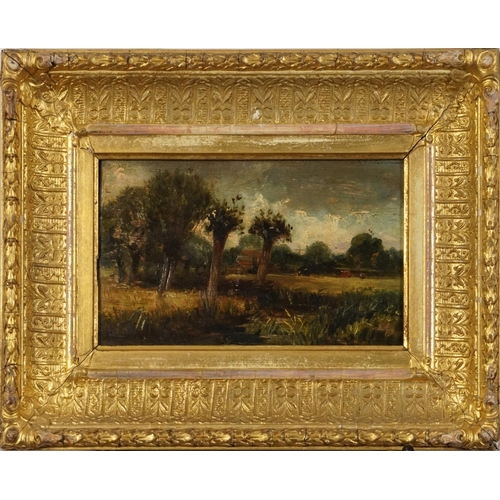 512 - Cattle grazing in a landscape, oil on wood panel, indistinctly inscribed in ink verso, mounted and f... 