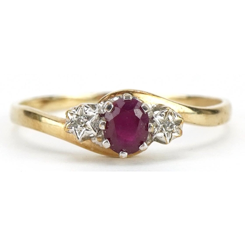 2141 - 9ct gold ruby and diamond three stone crossover ring, the ruby approximately 4.7mm x 3.8mm, size T/U... 