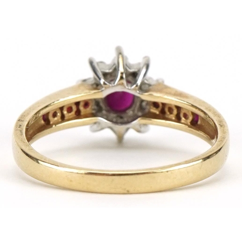 2129 - 9ct gold ruby and diamond cluster ring with ruby shoulders, the largest ruby approximately 5.2mm x 4... 