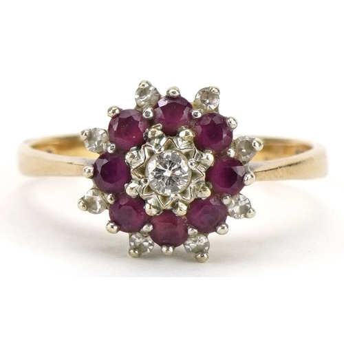 2157 - 9ct gold diamond and ruby three tier cluster ring, the largest diamond approximately 2.4mm in diamet... 