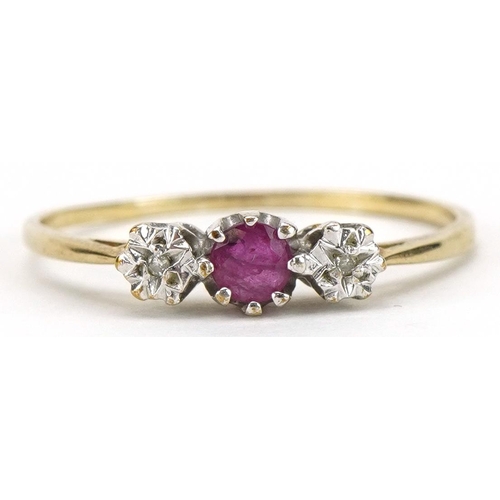 2103 - 9ct gold ruby and diamond three stone ring, the ruby approximately 3.2mm in diameter, size Q/R, 1.1g