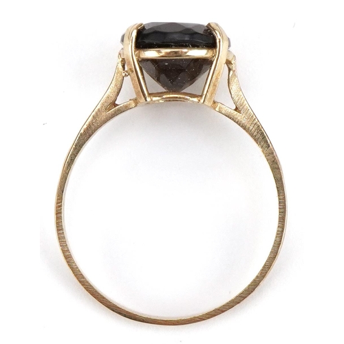 2172 - 9ct gold smoky quartz solitaire ring, the smoky quartz approximately 11.9mm x 9.7mm, size R, 2.4g