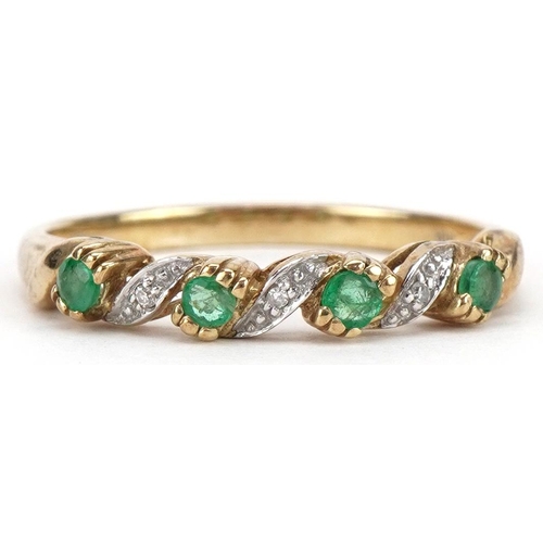 2305 - 9ct gold emerald and diamond crossover ring, size S, 1.9g