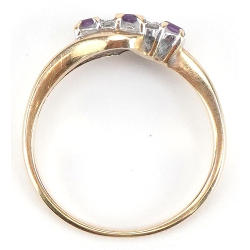 2279 - 9ct gold amethyst and diamond seven stone crossover ring, size N, 2.1g