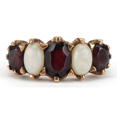 2115 - Victorian style 9ct gold garnet and cabochon opal five stone ring with ornate setting, size J, 3.9g