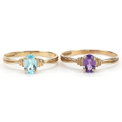 2340 - Two 9ct gold solitaire rings comprising topaz and garnet, sizes P and L, total 1.9g