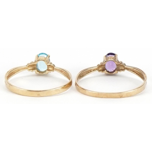 2340 - Two 9ct gold solitaire rings comprising topaz and garnet, sizes P and L, total 1.9g