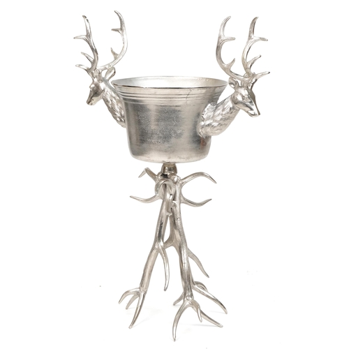 1013 - Brutalist style silvered metal floor standing ice bucket with two stag's heads, 105cm high x 70cm wi... 