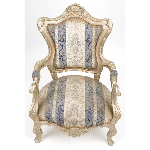 1105 - French style ornate gilt open armchair with blue and cream striped floral upholstery, 110cm high