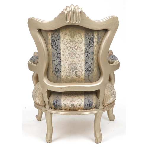 1105 - French style ornate gilt open armchair with blue and cream striped floral upholstery, 110cm high