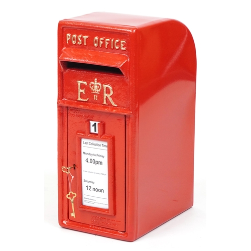 1049 - Elizabeth II style red painted metal postbox, 56cm high