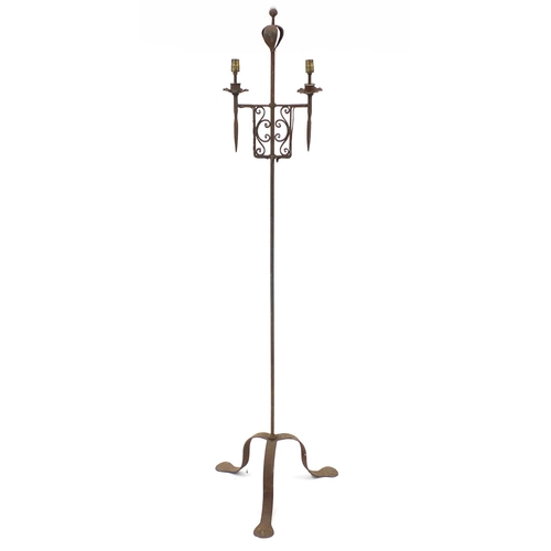 1139 - In the style of Gordon Russell Broadway wrought iron two branch candle stand , 175cm high