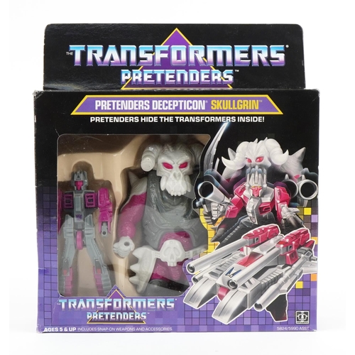 1479 - 1987 The Transformers Pretenders Decepticon Skullgrin figure set with box by Hasbro