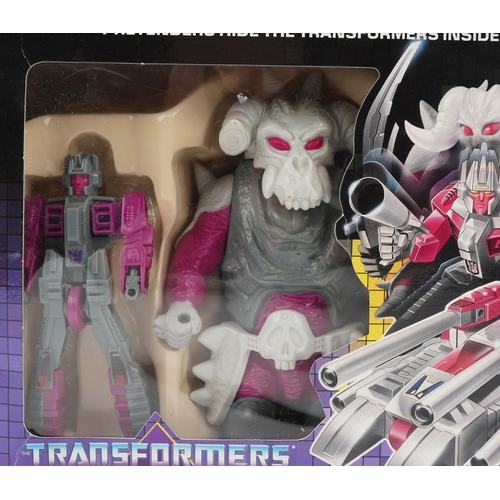 1479 - 1987 The Transformers Pretenders Decepticon Skullgrin figure set with box by Hasbro