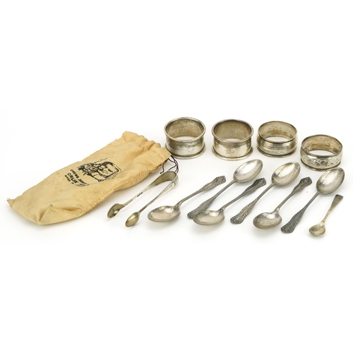 312 - Edwardian and later silver comprising set of six teaspoons, four napkin rings, sugar tongs and musta... 