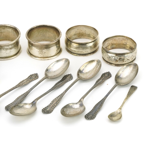 312 - Edwardian and later silver comprising set of six teaspoons, four napkin rings, sugar tongs and musta... 