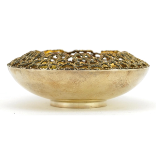 212 - Stuart Devlin, Elizabeth II circular silver gilt bowl with pierced rim with box, London 1972, 10.5cm... 
