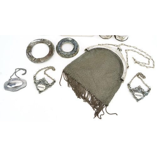 286 - Antique and later silver and white metal objects including a chainmail purse, napkin rings and decan... 