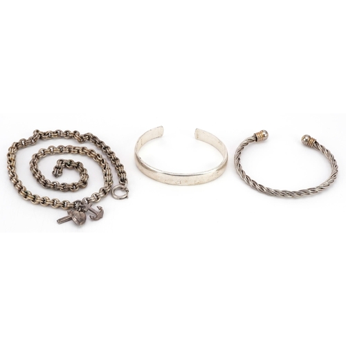 2372 - White metal jewellery comprising two bangles including a rope twist example and Belcher link necklac... 