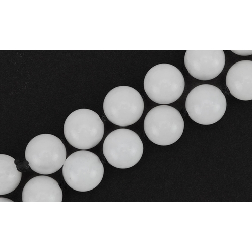 2165 - Chinese single strand white jade bead necklace, 70cm in length, 94.6g