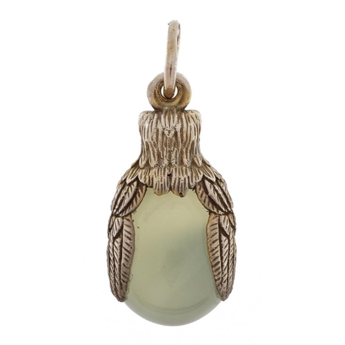 2190 - Silver mounted jade egg pendant in the form of an owl, impressed Russian marks, 2.5cm high, 5.4g