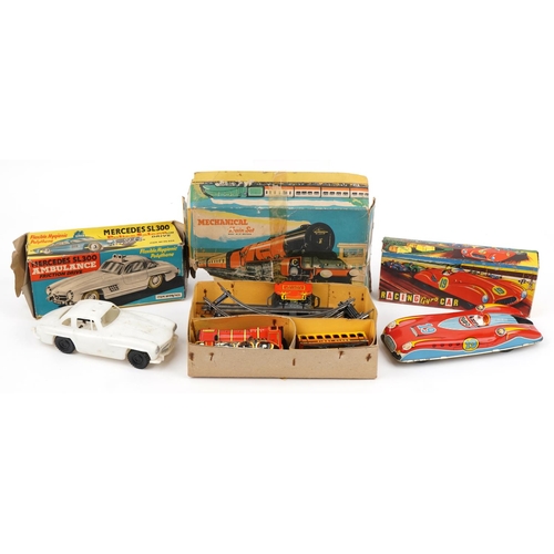 1470 - Vintage tinplate toys with boxes comprising mechanical train set, Mercedes SL300 friction drive ambu... 