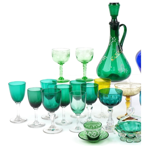 568 - Early 19th century and later glassware including Bristol blue jug, green claret jug enamelled with f... 