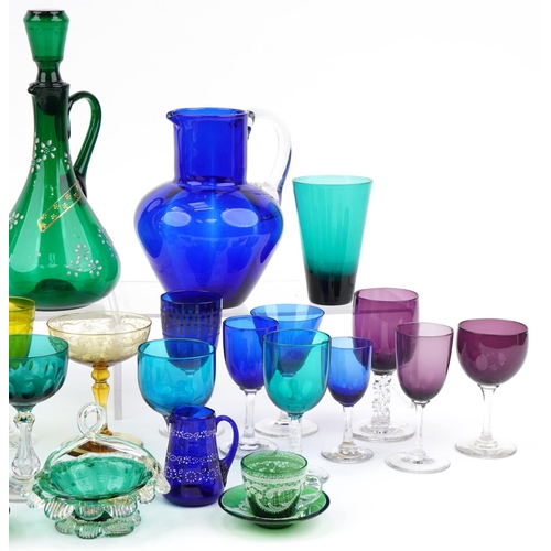 568 - Early 19th century and later glassware including Bristol blue jug, green claret jug enamelled with f... 