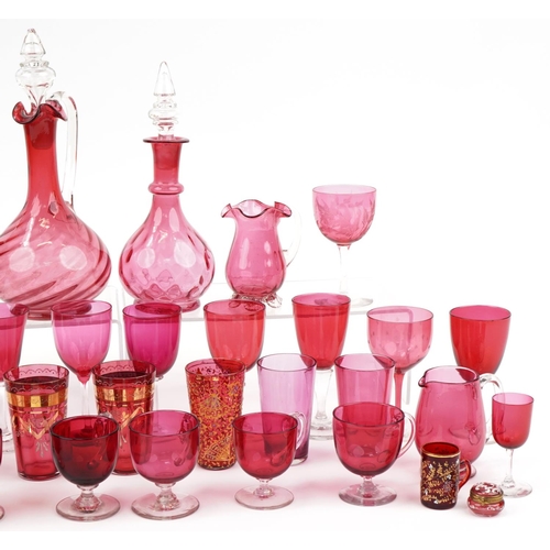 229 - Victorian cranberry glassware including claret jug, various glasses, enamel trinket box and aestheti... 