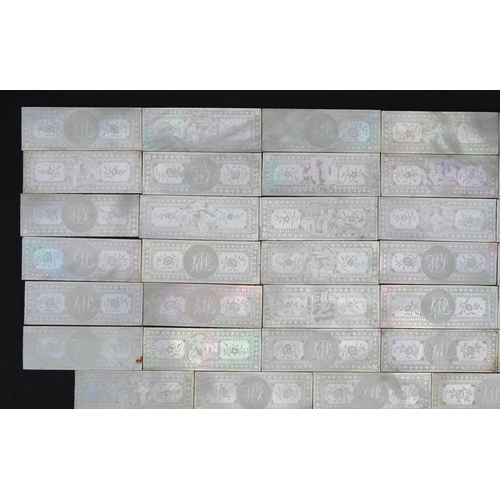 185 - Good collection of Chinese Canton mother of pearl gaming counters finely carved with figures amongst... 