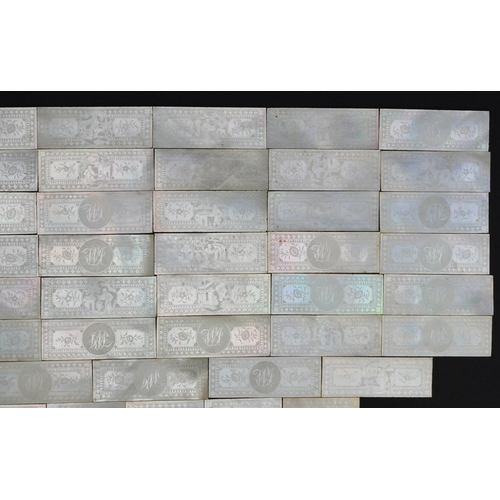 185 - Good collection of Chinese Canton mother of pearl gaming counters finely carved with figures amongst... 