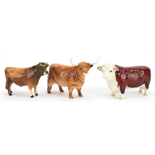 442 - Three Beswick cows including Champion of Champions and Champion Dunsley Coy Boy, the largest 19cm in... 