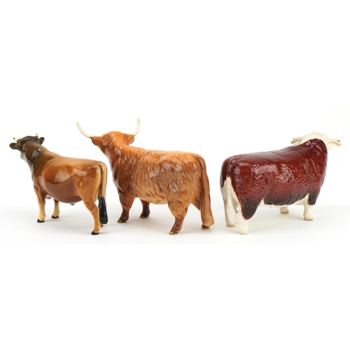 442 - Three Beswick cows including Champion of Champions and Champion Dunsley Coy Boy, the largest 19cm in... 