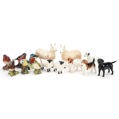 432 - Twelve Beswick animals comprising six birds, four dogs and two sheep together with two Border Fine A... 