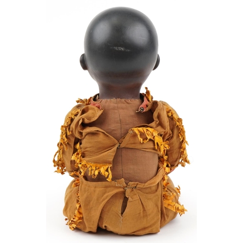 1388 - Armand Marseille, 19th century German bisque headed African doll with straw filled body and composit... 