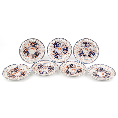 574 - Seven Japanese Imari porcelain plates with pierced borders hand painted with flowers, each 22.5cm in... 