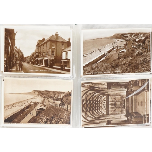 1614 - Collection of topographical social history postcards arranged in three albums including street scene... 